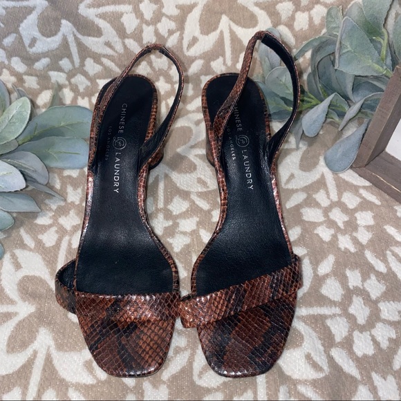 Maroon and black Snake print heels. - Picture 2 of 4